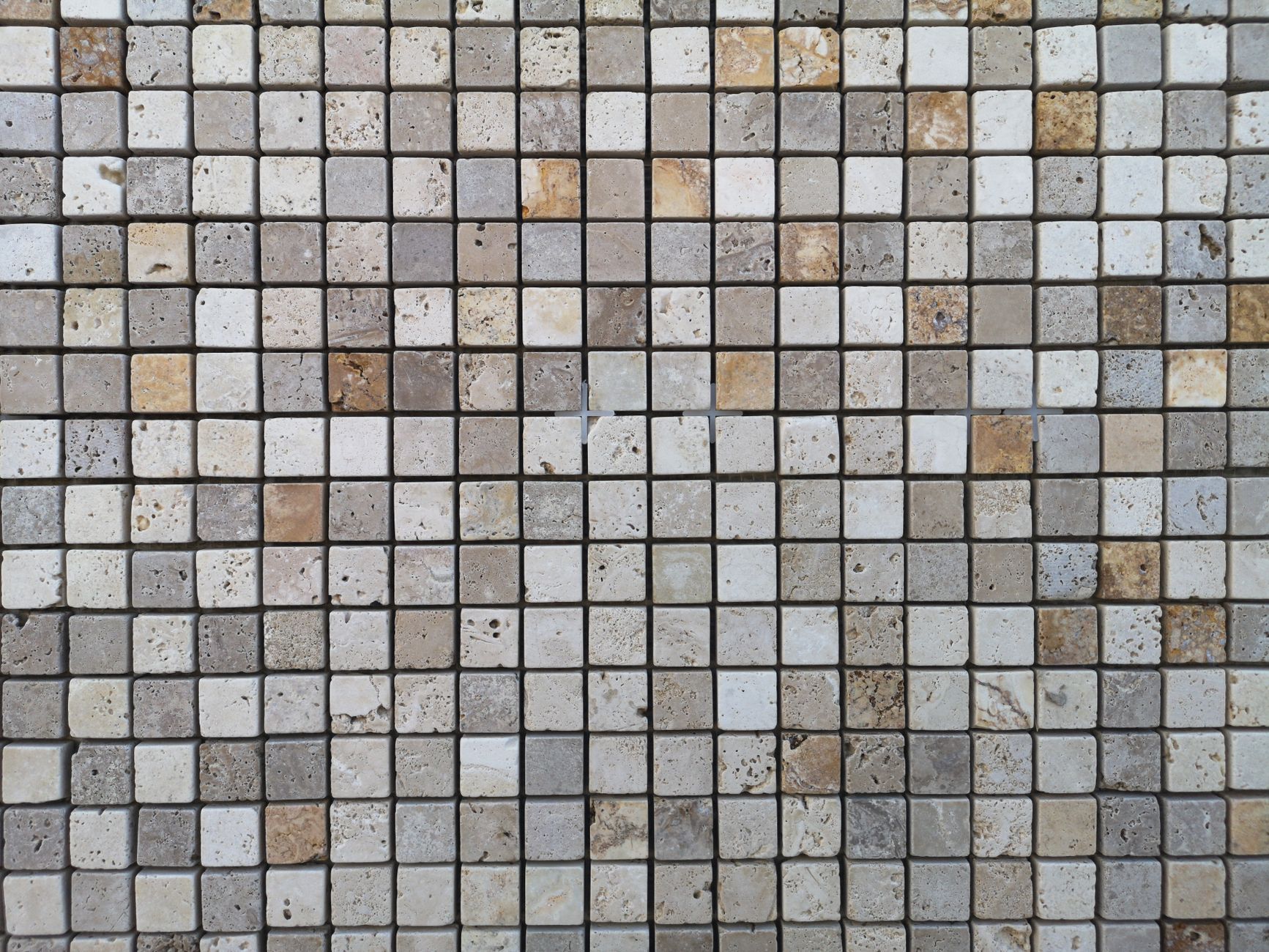 Close-up view of porcelain tile flooring in a sunroom