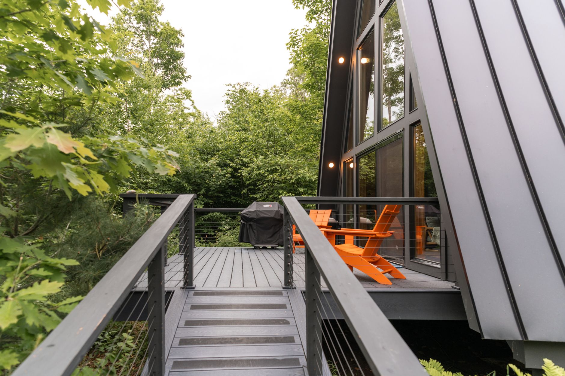Aluminum deck railing on a modern backyard deck