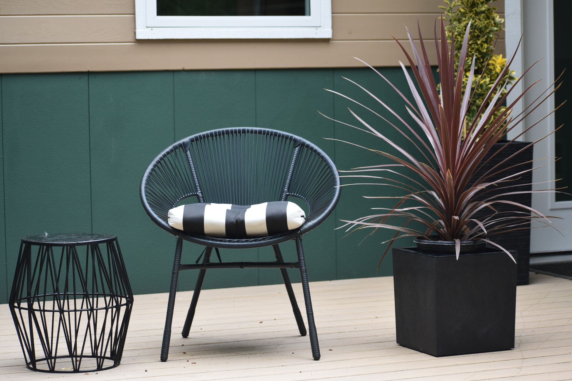 Modern composite backyard deck built to resist moisture in a humid Gulf Coast climate