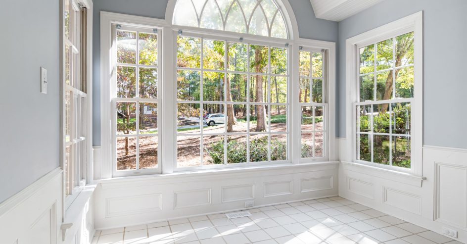Bright comfortable sunroom with large windows staying cool and pleasant year round