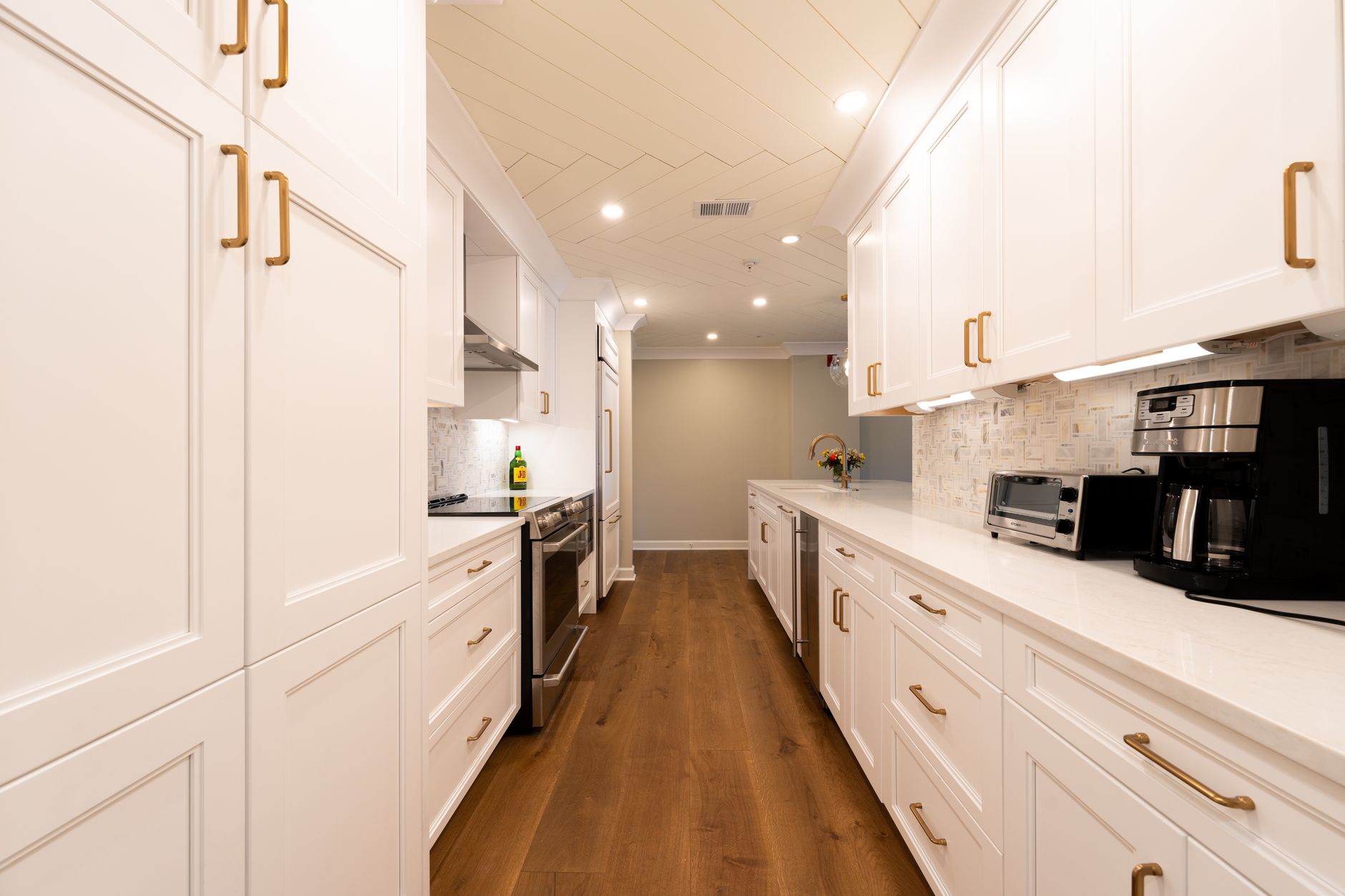 Galley-style outdoor kitchen with two parallel counters facing each other