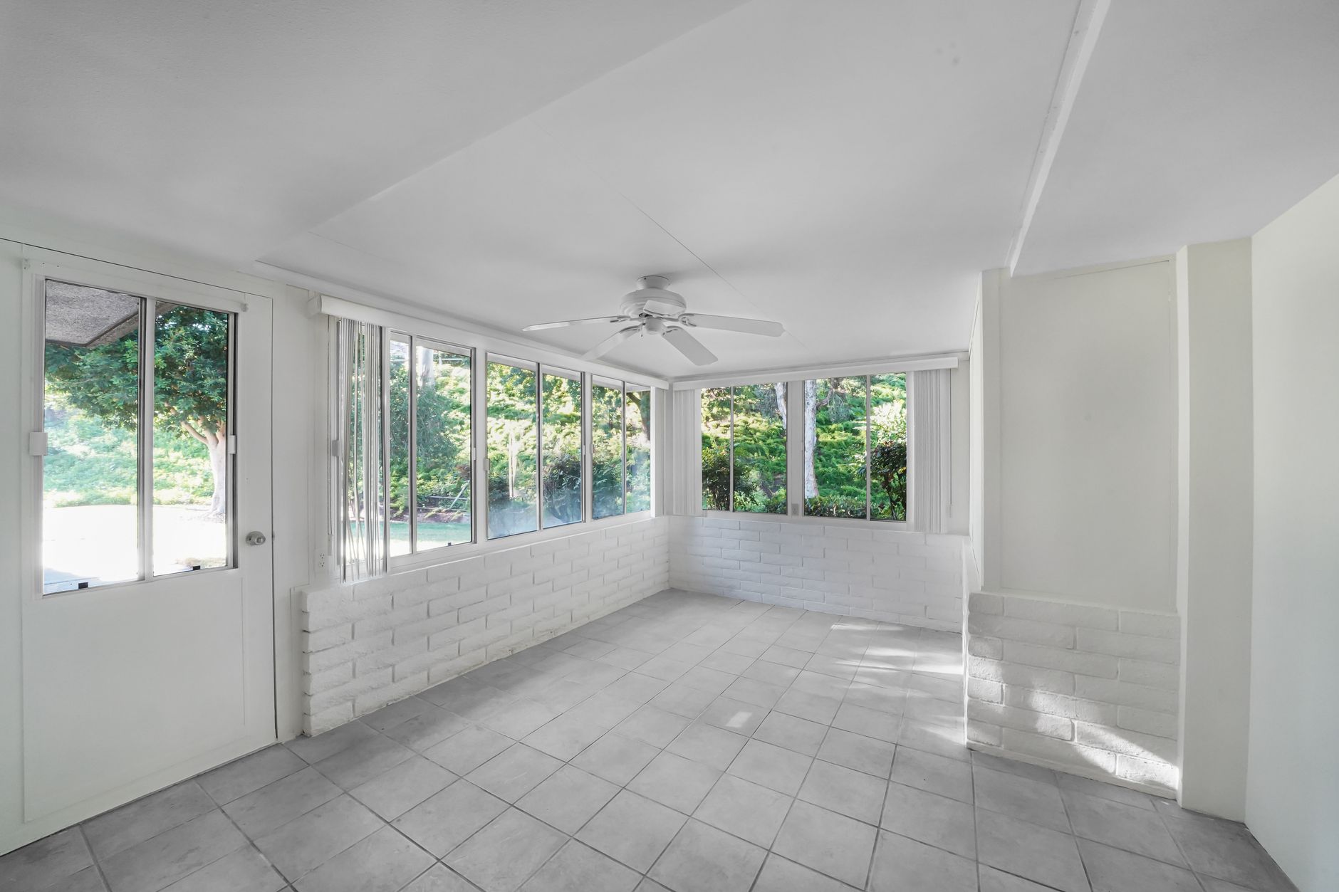 Insulated sunroom addition designed to add year-round living space and resale value