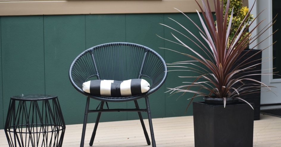 Modern composite backyard deck built to resist moisture in a humid Gulf Coast climate