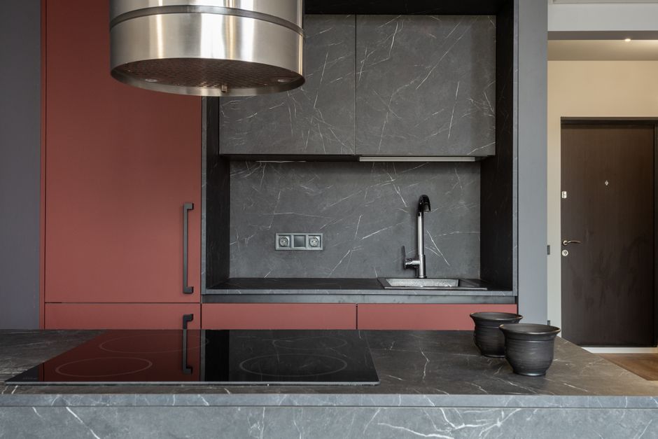 Content image 2 - An outdoor kitchen sink with running water in a covered structure