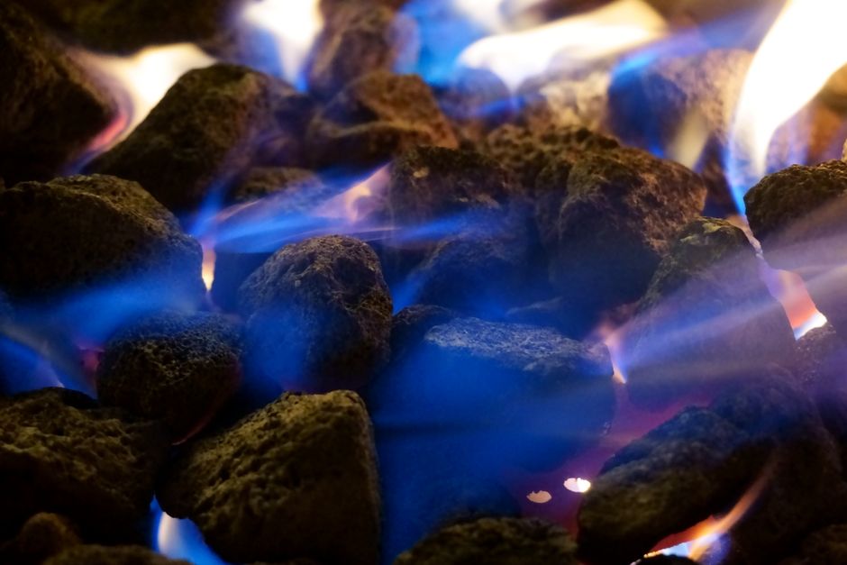 Content image 1  - A gas fire pit with glass rocks and clean flame